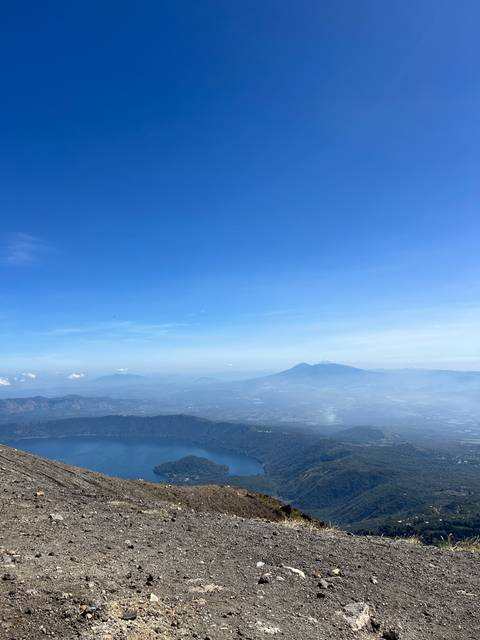 Mountainous landscape with a body of water below.