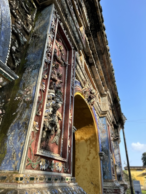 Close-up of ornate architectural details with colorful designs.