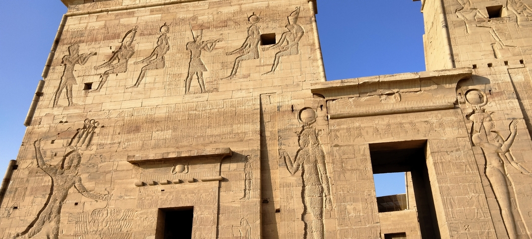 Close-up of ancient Egyptian carvings in a temple.