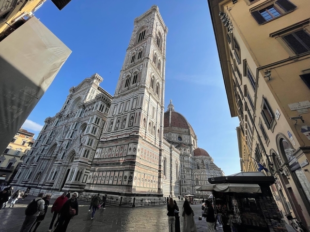 Florence Cathedral with people on the street in foreground.