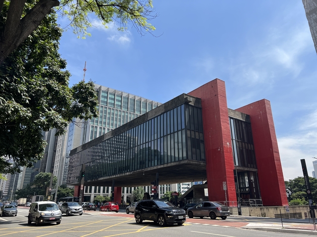       Modern architectural building with a clear sky.
  