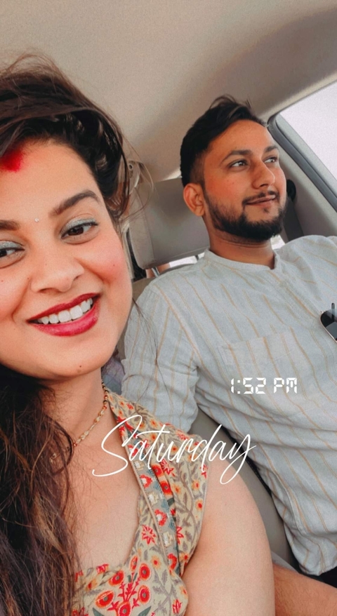       Close-up selfie of a smiling couple
  