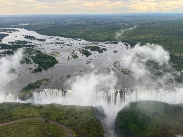 Aerial view of Victoria Falls and surrounding landscape.