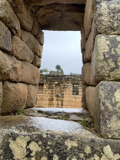 Stone walls and ruins of an ancient structure.