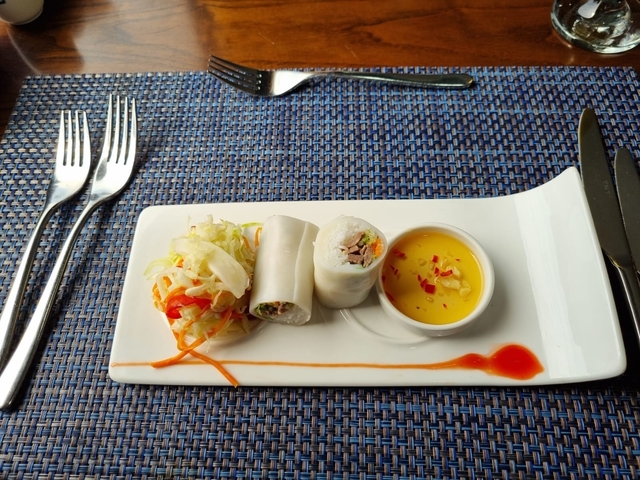 Plate of Vietnamese spring rolls and salad.