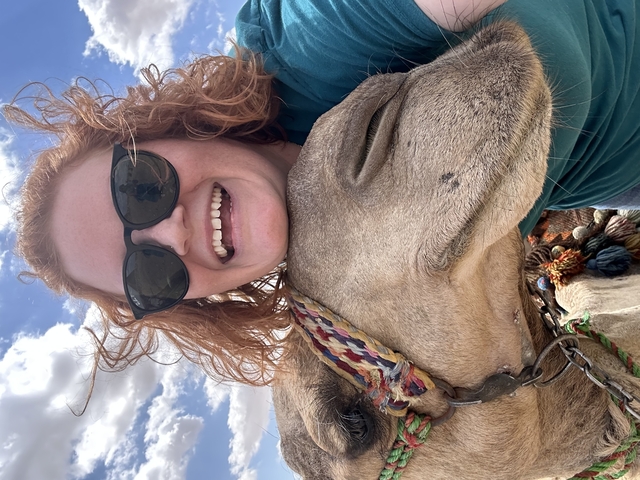 Selfie with a camel in the desert.