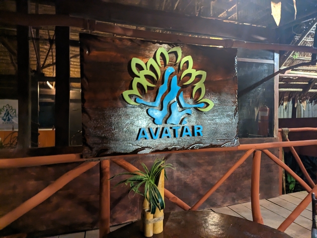       Avatar lodge signage with tribal design.
  