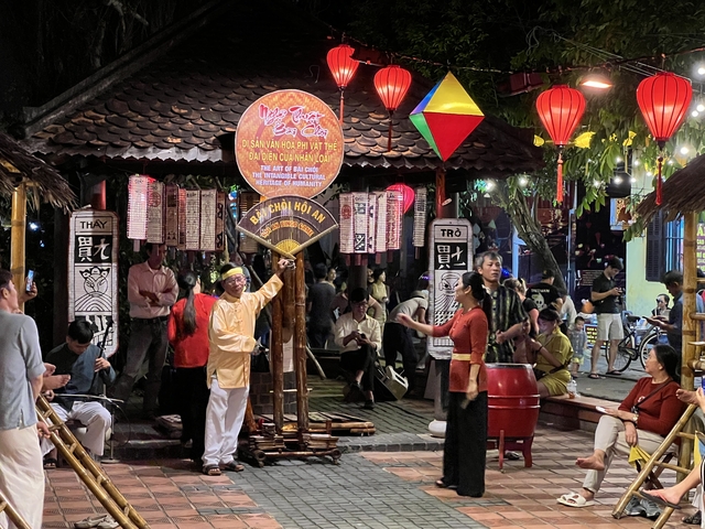Vibrant scene at a cultural night market in Hoi An.