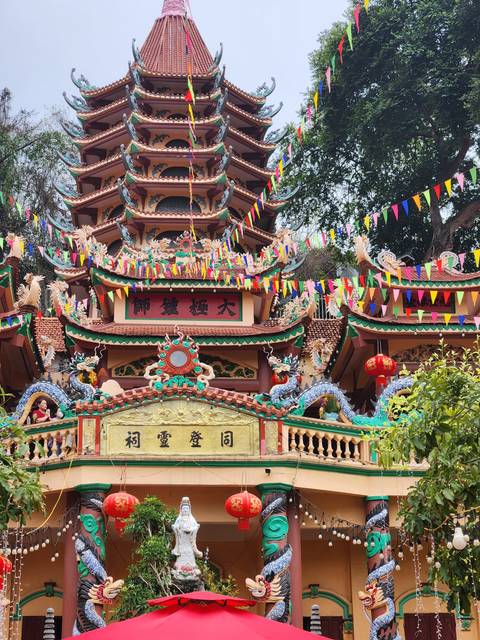       Colorfully decorated temple with intricate details.
  