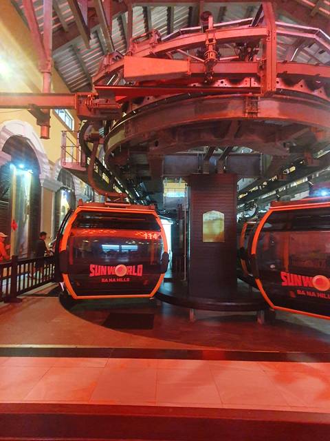 Cable cars in an indoor station.