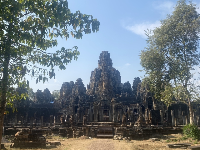       Ruins of an ancient temple surrounded by trees.
  