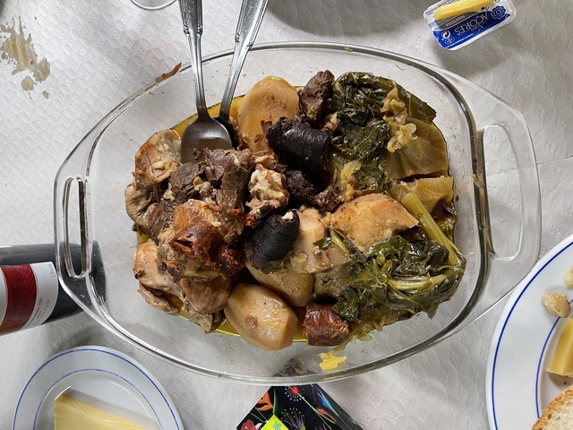       Traditional dish with various meats and vegetables.
  