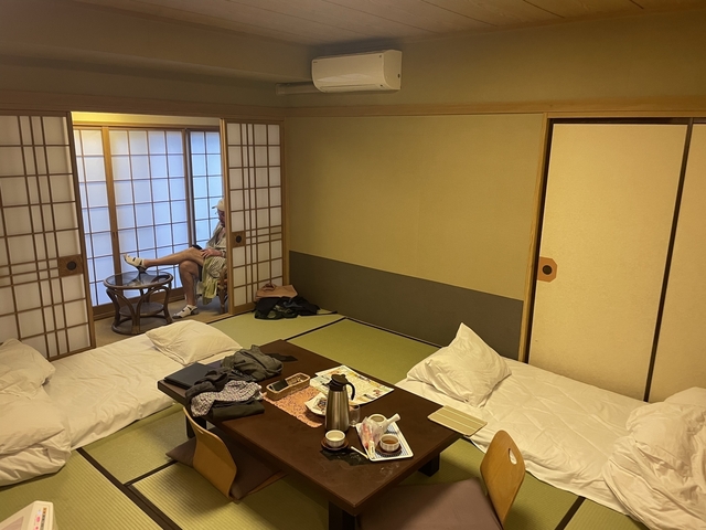 Japanese-style room with futons and sliding doors