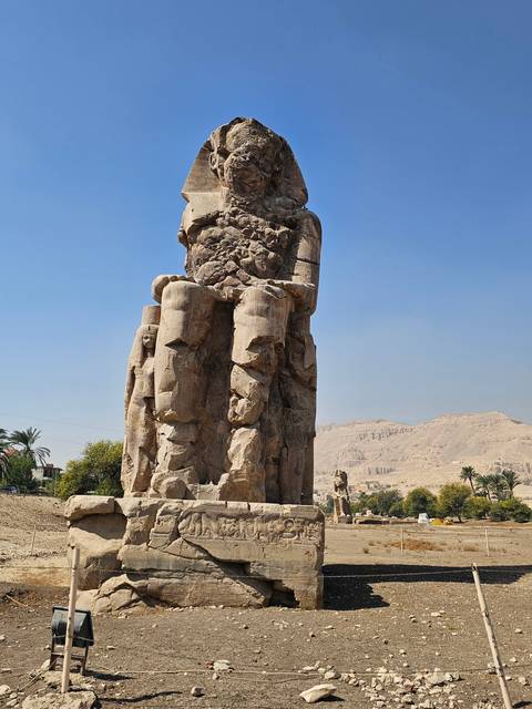 Colossal statue of Pharaoh at the historical site in Egypt.