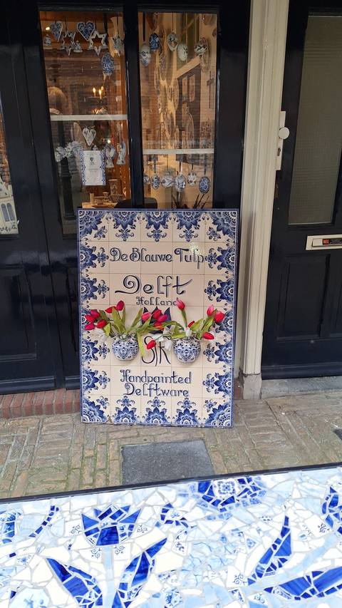 Storefront with Delft tiles decoration.