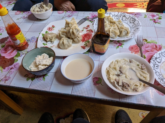       Traditional Mongolian meal served on a table.
  