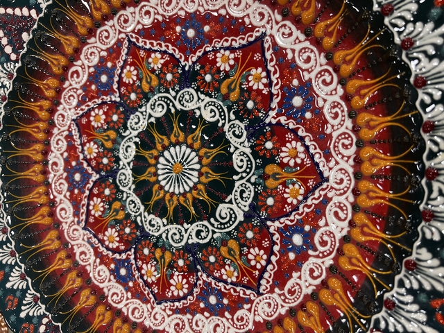       Colorful patterned artwork close-up.
  