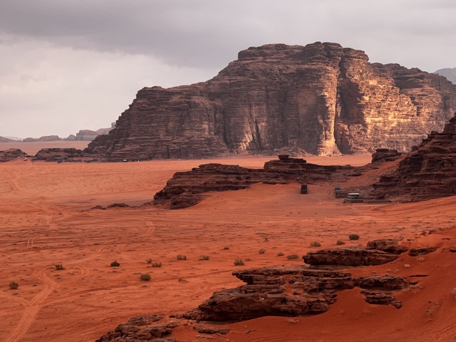       Desert landscape with rock formations.
  