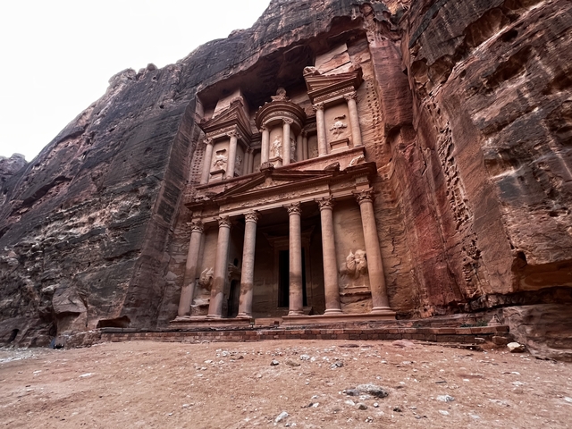       The Treasury at Petra, carved into the sandstone cliff.
  