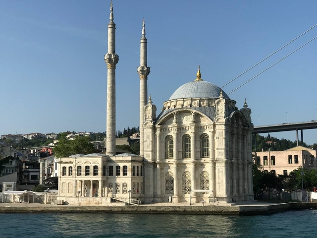 Historic mosque with domes and minarets.