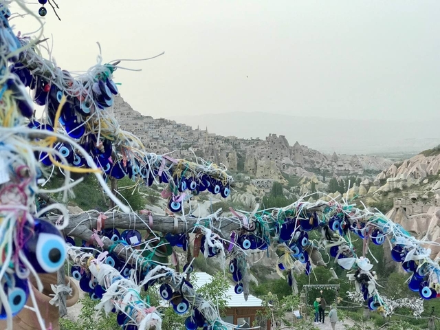       Valley with rock formations and ornaments in foreground.
  