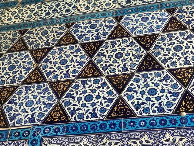 Detailed blue tile patterns.