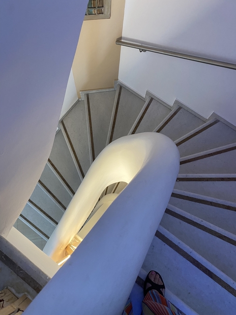       Spiral staircase captured from above.
  