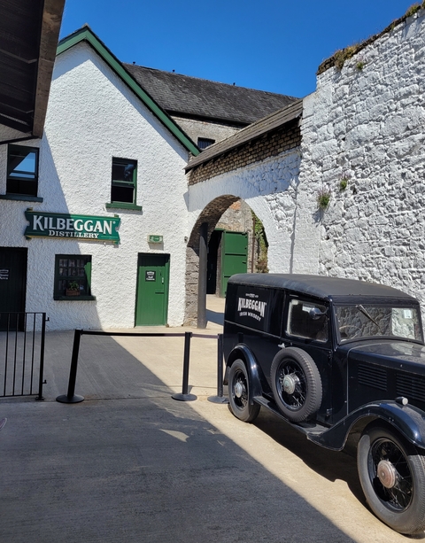 Kilbeggan Distillery with vintage car.