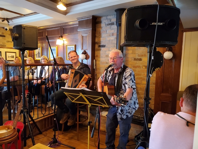 A live music performance in an indoor setting.