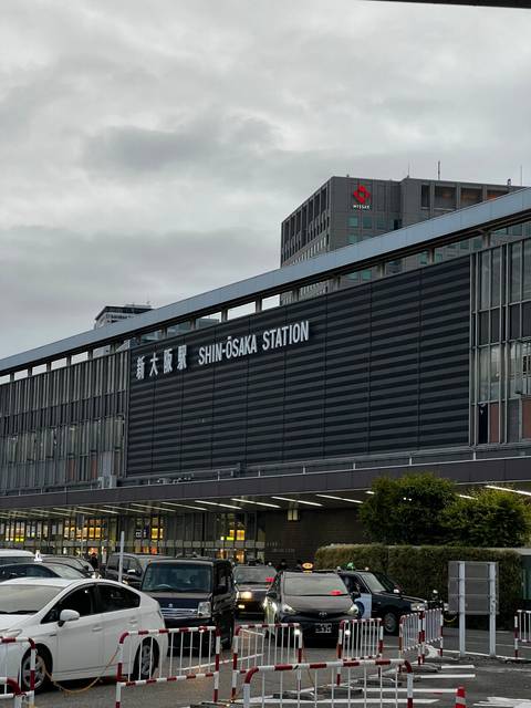       Shin-Osaka Station building with clear sky.
  