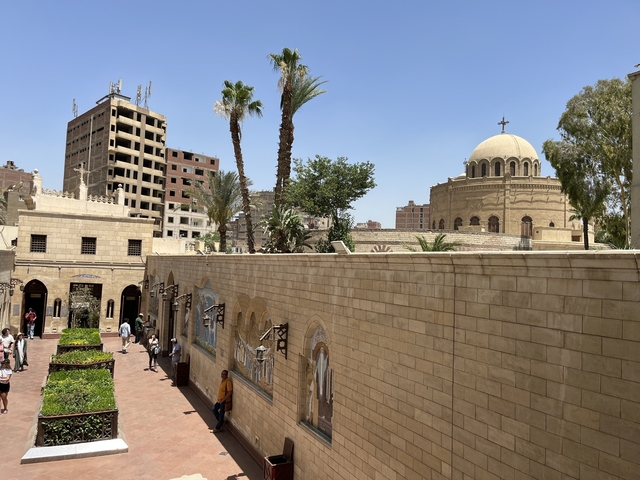 Courtyard with domed building in Cairo