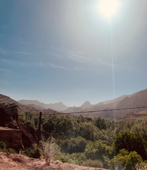       Hazy mountain landscape with soft sunlight.
  