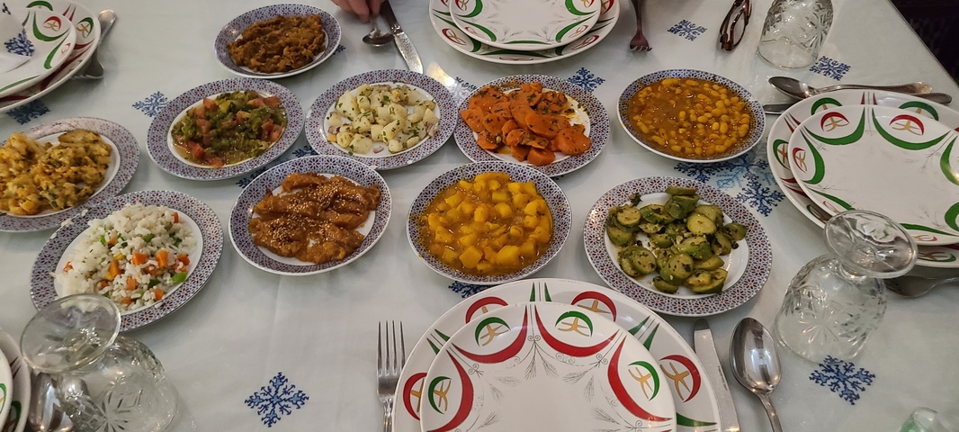      Spanish tapas dishes arranged on a table.
  