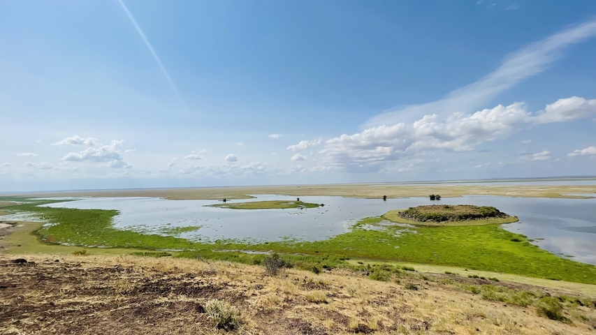 Wide view of a lake in a deserted landscape.