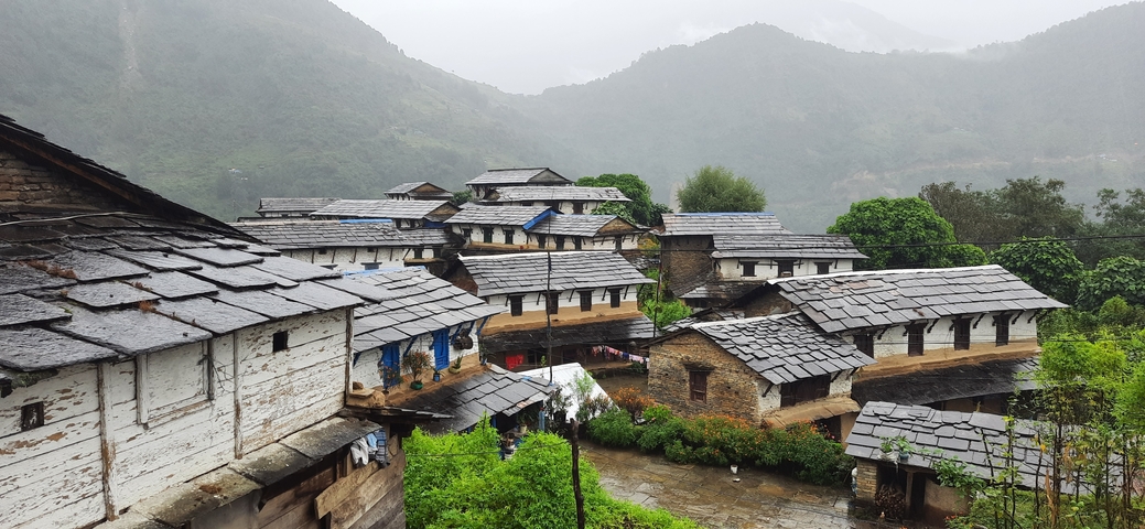 Houses in a misty mountain village.