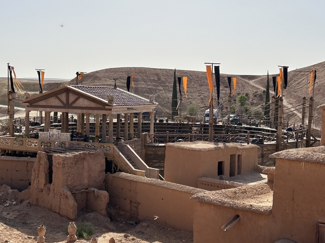 Film set with ancient Roman style architecture.