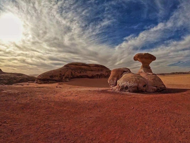       Natural rock formations in a desert landscape
  