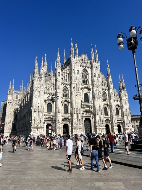       Detailed view of the facade of the Milan Cathedral.
  