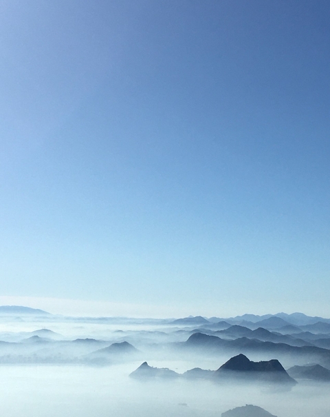 Clear blue sky with minimal detail.