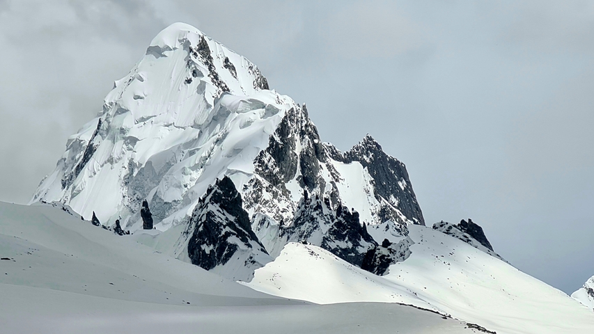       Majestic snowy mountain peaks.
  