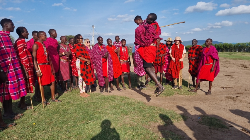 Group of Maasai people performing traditional dance.