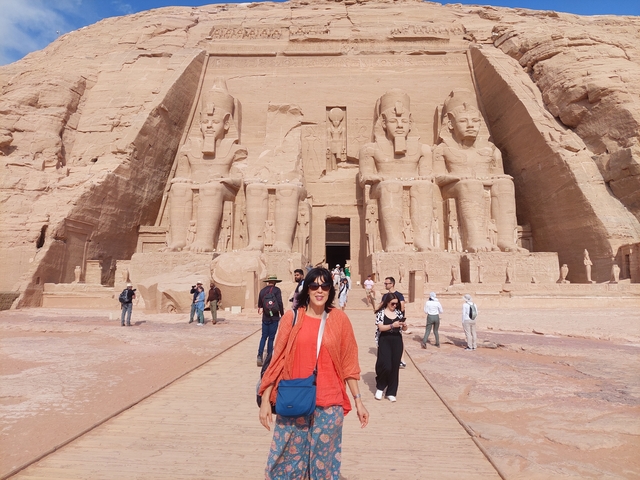       Person in front of the Abu Simbel temples.
  
