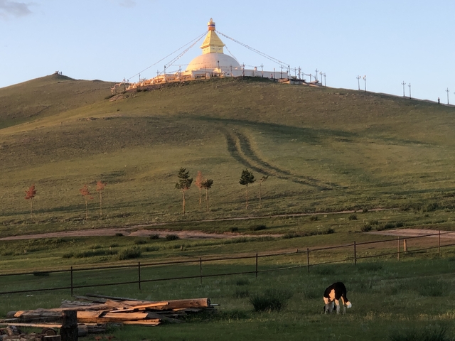       Hill with a structure at the top, tracks leading up.
  