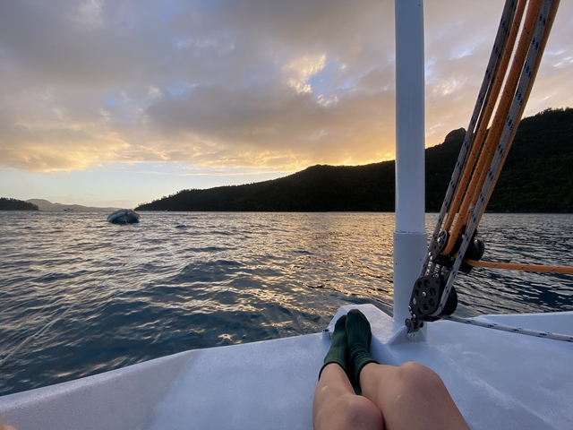 Ocean scenery from a boat at sunset.