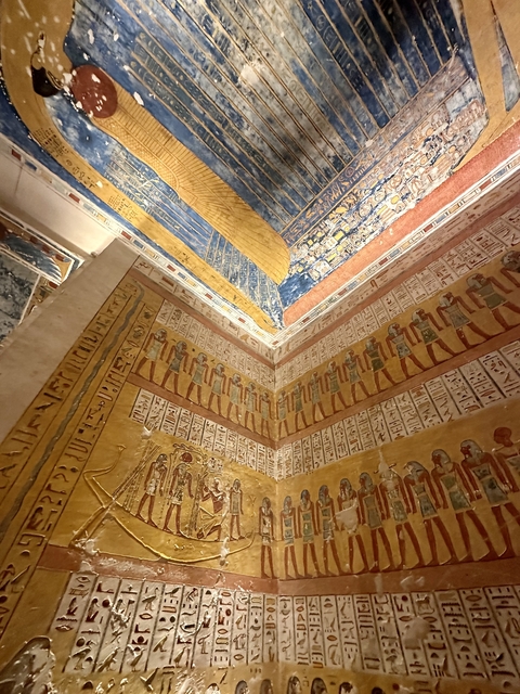      Intricately decorated interior walls with ancient inscriptions.
  
