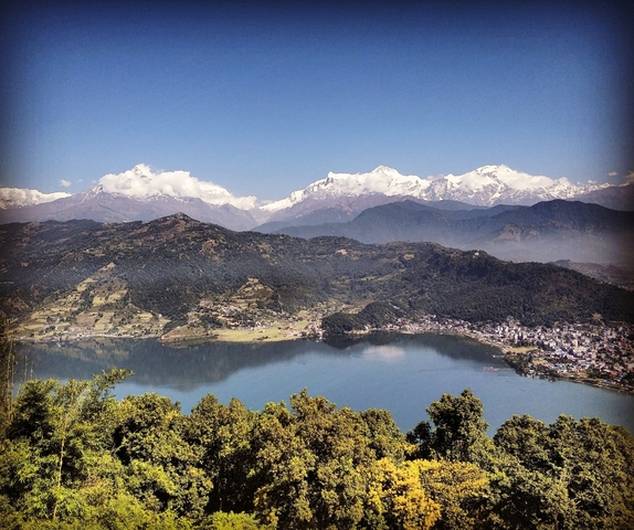       Mountain range with a lake in the foreground.
  