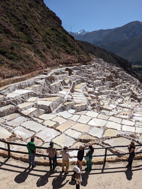       Terraced salt pools in a mountainous area.
  