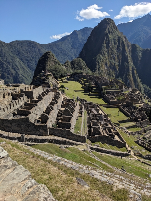       Ancient Incan ruins in a mountainous landscape.
  