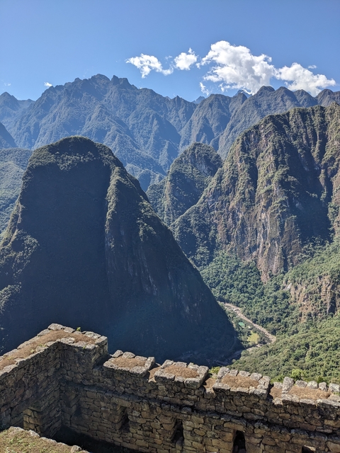 Mountain range in a lush green region.