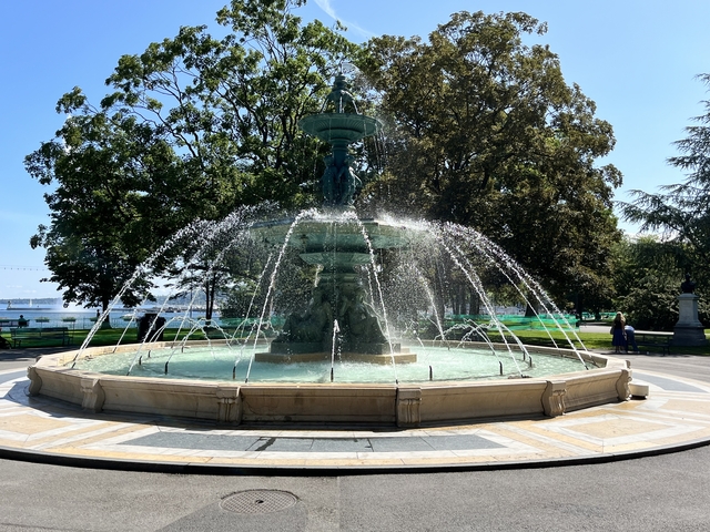       Large ornate fountain in a park setting.
  